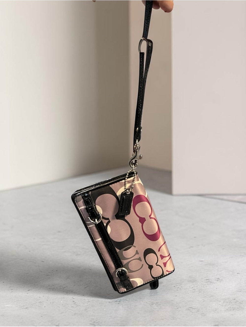 Coach Signature Wristlet Phone Case in Pink and Black